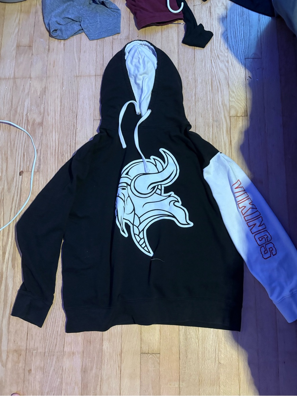 Men's Black Hoodie with White Hood & Sleeve Featuring Vikings Graphic
